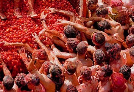 Festivals Around The World - La Tomatina Happens in Spain is A Big Tomato Festival