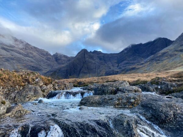 Unique Places to Visit For Tourists - Fairy Pools is located in Scotland in The Cuillin Hills