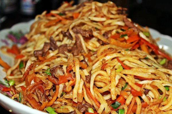 Top 10 Things - Tsuivan A noodles dish with Pork, Beef And Mutton