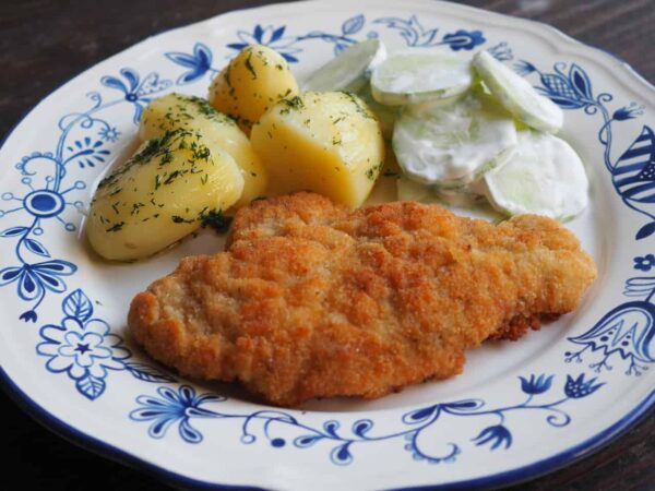 Travel Guide Poland - Kotlet schabowy is Polish Cutlet With Potato And Salad n The Side
