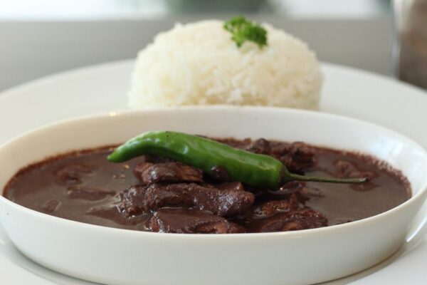 Dinuguan is Normally Served With Puto Rice On The Side - Budget Food in Asia