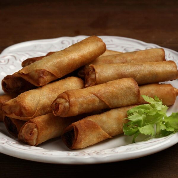 Filipino Lumpia is Egg Rolls With Meat Inside With Soy and Sweet Sauce