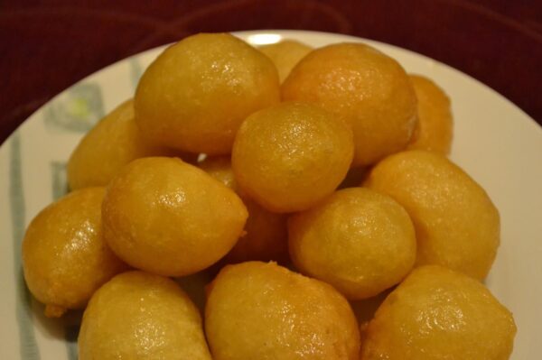 Loukoumades is A Glazed Honey Dessert Covered With Chopped Walnut - A Guide to Tasty Food in Cyprus