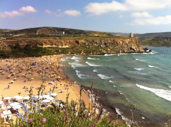 Malta Beaches Travel Guide - Golden Bay Malta Offers Sun Beds And Large Umbrellas