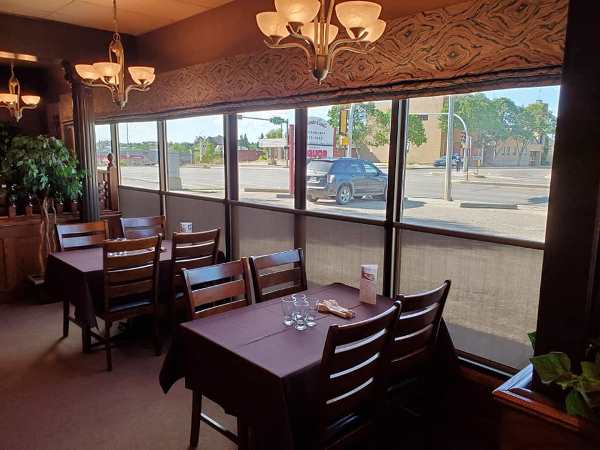 Monte Carlo Restaurant is on 48 Avenue Road Just Before 50 St - Canada Food Guide