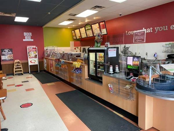 Quiznos Located in Brentwood Commons Shopping Centre Selling Subs and Sandwiches