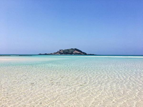 Sunbathing on the Hyeopjae Beach near the Hallim Park is among the Things to Do in Jeju