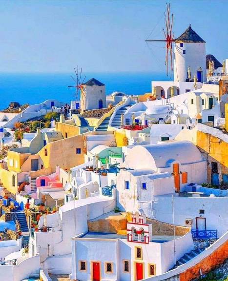 Oia Coastal Town in Thira with White-Washed Beautiful Roof Houses - Top Attractions in Santorini